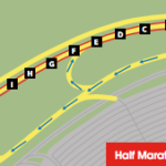 The arrows lead from the top of the 'Wonder' lot at Epcot west on Woodpecker Lane to the corrals.